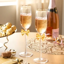 Champagnerflöten mit Schleife