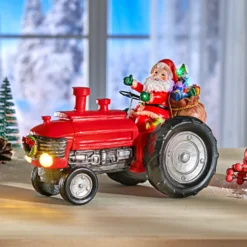 Dekofigur "Santa auf Traktor" mit Musik und LED