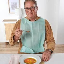 Einweg-Lätzchen mit Auffangtasche 20er-Set