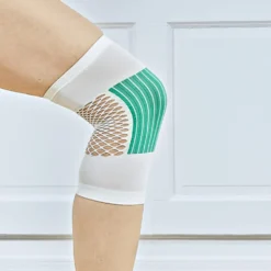 Ellenbogen-/Kniebandage mit Gelenkpflege grün