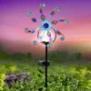 Gartenstecker Windspiel "Pfau" mit Solarleuchte