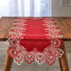 Jacquard-Tischläufer mit filigranem Spitzensaum rot Eldo