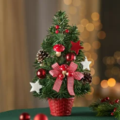 Künstlicher Weihnachtsbaum geschmückt im Topf Eldo