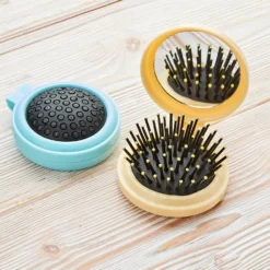 Mini-Haarbürste mit Handspiegel, 2er-Set