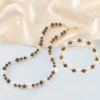 Muschelarmband mit Tigerauge