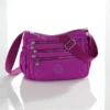 Nylon-Umhängetasche "Inga" mit RFID-Schutz fuchsia
