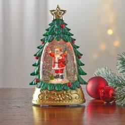 Schneekugel "Tanne mit Weihnachtsmann" grün